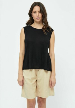 Black sleeveless top made of soft fabric, featuring a relaxed fit and round neckline, paired with beige loose-fitting shorts.
