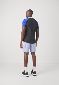 adidas Performance TENNIS ERGO - Sports shorts - blue spark