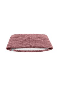Knitted headband in soft pink hue, featuring a textured surface and a white inner lining. Measures approximately 30 cm in width.
