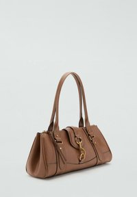 Brown leather handbag with two shoulder straps, gold hardware, zip closure, and decorative chain detail. Smooth texture with stitched accents.