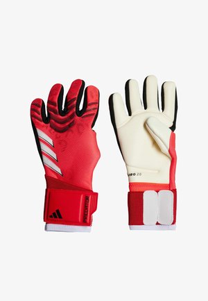 Guanti da portiere da soccer rossi con impugnatura testurizzata, accenti bianchi e un cinturino sul polso sicuro. Design flessibile con un mix di materiali e colori.