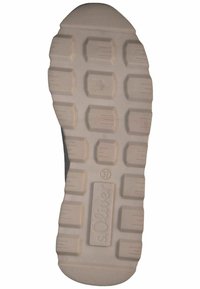 Black sneaker outsole with white rubber tread. Features textured hexagonal patterns and a branded logo. Size marked as 37.