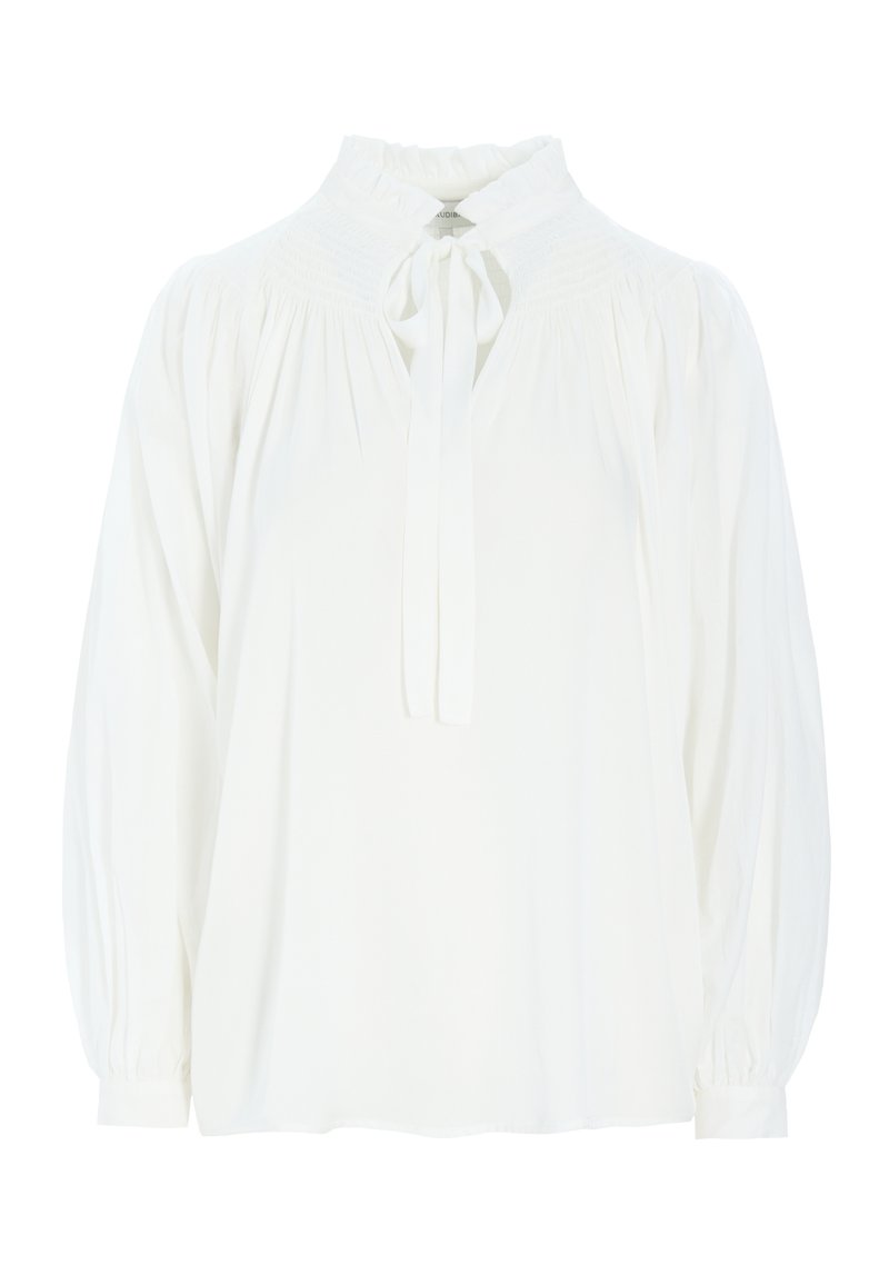 Balta blūze ar augstu čokurotu apkakli, garām balloon piedurknēm un priekšējo sasienamo aizdari. Izgatavota no viegla, teksturēta auduma.