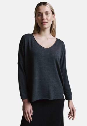 Graues V-Ausschnitt Langarmshirt aus weichem Stoff, mit lockerer Passform, gerippten Bündchen und einem leicht unregelmäßigen Saum.