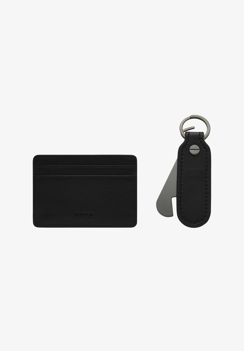 Black leather card holder with smooth texture and stitched edges, accompanied by a matching keychain with a metal accent and keyring.
