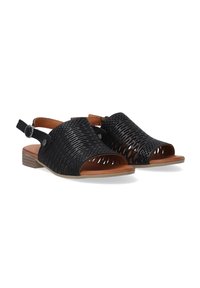Zwarte geweven sandalen met open teen, uitsnijdingen, verstelbare gesp en bruine accenten op de zool. Platte hak, casual stijl.