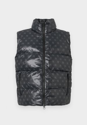Black padded vest with a high collar, featuring a shiny texture and an all-over embossed logo pattern. Front zip and side pockets.