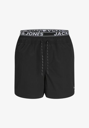Pantaloncini da bagno neri con vita elastica, caratterizzati da un logo bianco e cordoncino. Realizzati in materiale leggero con una texture liscia.