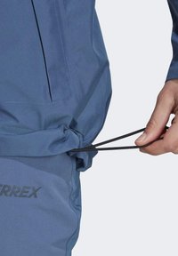 Adidas Terrex XPR GOR PAC JACKET - Veste imperméable - blue