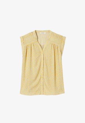 Blouse jaune sans manches avec petit motif floral blanc, épaules froncées et fermeture à boutons à l'avant.