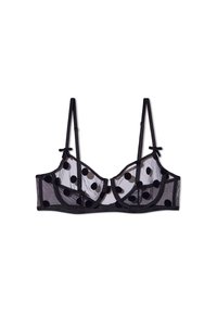 Reggiseno in rete nera trasparente con motivo a pois, supporto con stecche, spalline regolabili e fiocchi decorativi ai bordi delle spalline.