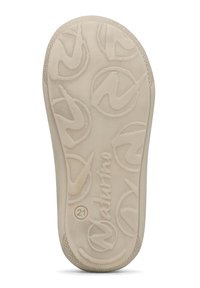 Světlé béžové podešev boty s texturovanými vzory kruhových log, s hladkým povrchem a zaoblenými okraji. Označeno "21" a "Naturino."