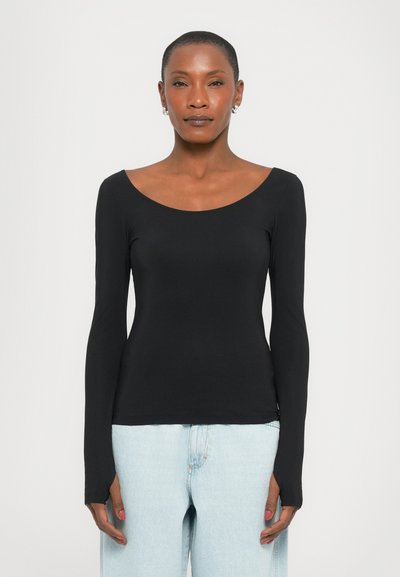 Black long-sleeve top with a wide scoop neckline, made of stretch fabric, featuring fitted sleeves and a smooth texture.