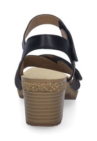 Schwarze Ledersandale mit verstellbaren Riemen, Kork-ummanteltem Absatz und strukturiertem Sohlen. Besitzt eine abgerundete Form und eine gepolsterte Innensohle für Komfort.