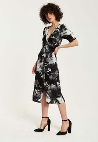 Liquorish MONO ABSTRACT PRINT KNOT FRONT MIDI - Day dress - black