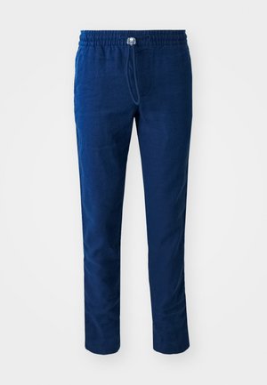 Pantalons bleu marine avec une coupe décontractée, taille élastique, cordon de serrage ajustable et une texture de tissu lisse, adaptés pour une tenue décontractée.