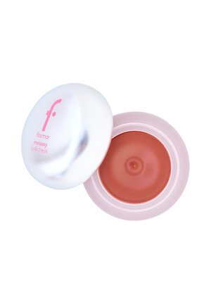 Open pink and silver compact container with brown mousse lip and cheek makeup product inside.