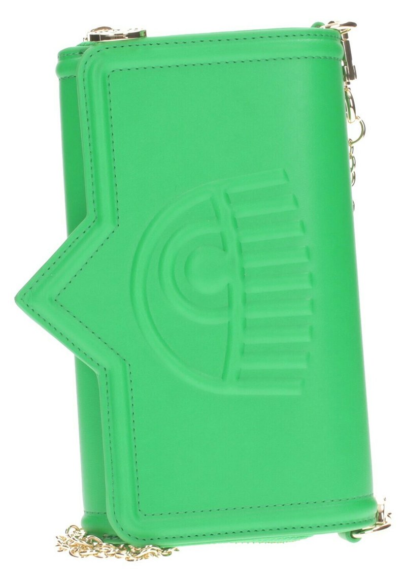 Groene faux leren handtas met een stervormig ontwerp. Voorzien van geperst detail, een ritssluiting en een gouden kettingriem.