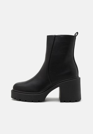 UNISEX - Classic ankle boots - black
