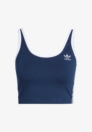 Námořnickomodré sportovní crop top s bílým obšitím. Bavlněný materiál, výstřih do U a malé bílé logo Adidas na levé části hrudi.