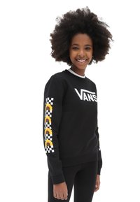 Sudadera de forro polar negra con el logo blanco de "VANS" en el pecho y gráficos de girasoles sobre un fondo de cuadros a lo largo de las mangas.
