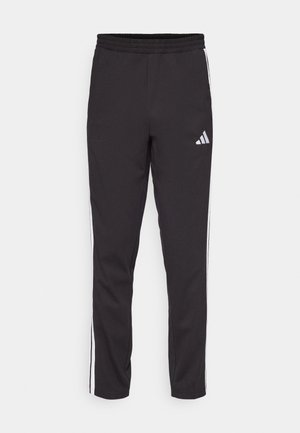 adidas Sportswear ESSENTIAL THREE STRIPES SINGLE  - Tracksuit bottoms - black/white