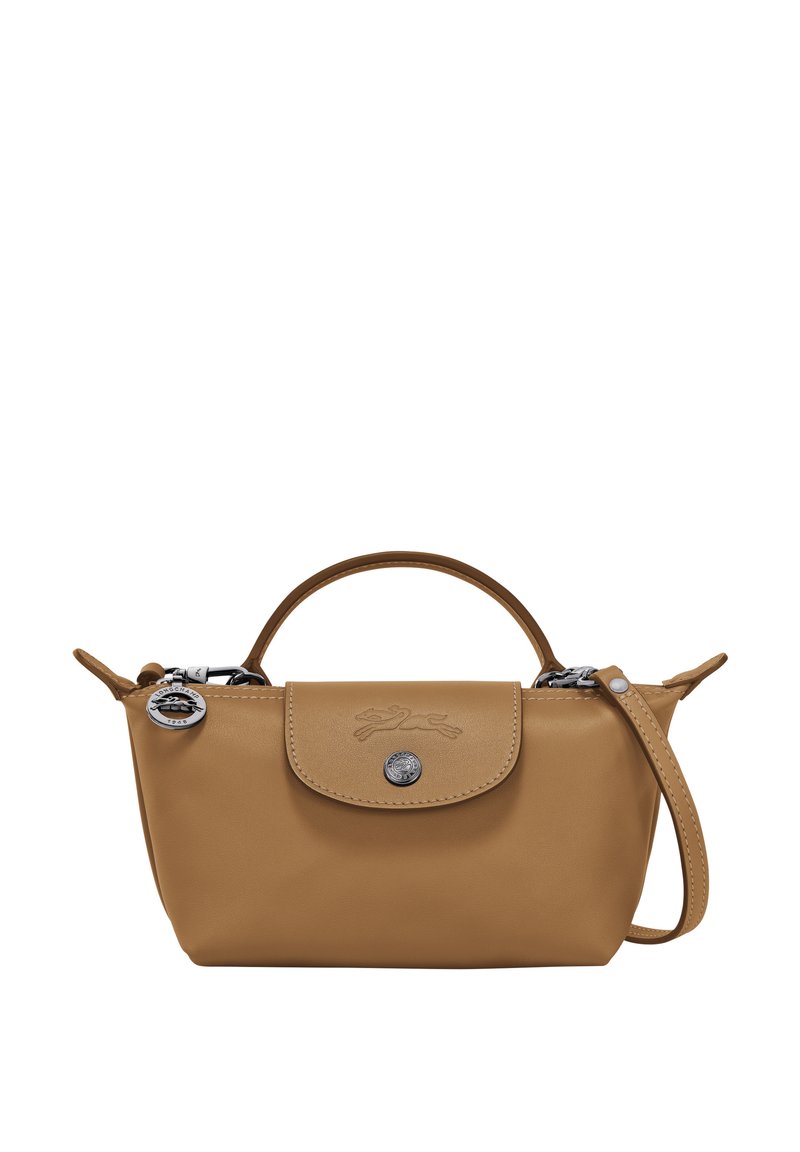 Tan leather handbag with a rounded shape, top handle, detachable shoulder strap, embossed logo, and silver hardware accents.