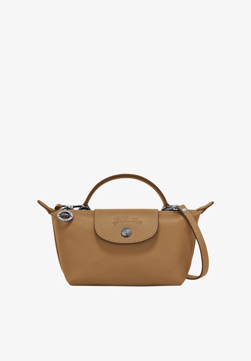 Tan leather handbag with a rounded shape, top handle, detachable shoulder strap, embossed logo, and silver hardware accents.