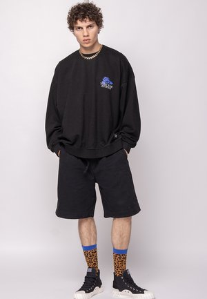 Kaotiko CREW WASHED EYE TRUST YOUR INTUITION UNISEX - Φούτερ - black