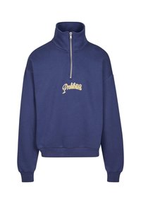 Felpa blu navy con colletto alto, zip a metà lunghezza e "Proibito" ricamato in giallo sulla parte anteriore. Materiale misto cotone.