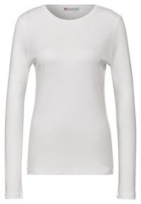 Langärmliges weißes T-Shirt aus Baumwolle. Verfügt über einen runden Hals, eine glatte Textur und eine figurbetonte Silhouette ohne Muster oder Akzente.