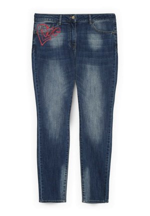 Tummansiniset haalistuneet kapeat farkut, joissa on etutaskut, vyölenkit, napillinen kiinnitys ja punainen sydämenmuotoinen graffitikuva vasemman reiden yläosassa.