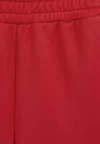 WE Fashion Auduma bikses - red
