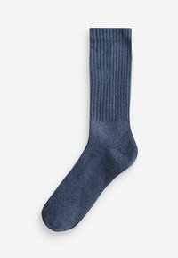 Blaue gerippte Socke mit glatter Textur, die über eine verstärkte Zehen- und Ferse verfügt. Das Design reicht bis zur Wade.