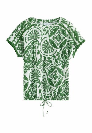 Green and white patterned short-sleeve top with a drawstring hem and scalloped sleeve edges. Features floral and decorative motifs.