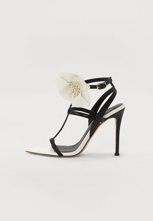 High heeled sandals - neve