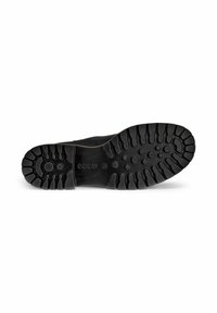 Suela de zapato de goma negra con un profundo dibujo para tracción, que presenta patrones circulares y alargados. Logo de Ecco grabado cerca del centro.