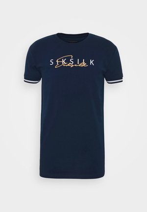 Navy blue short-sleeve t-shirt with white and yellow "Siksilk" logo on chest and white double stripes on sleeve cuffs.
