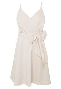 Beige ärmlös omslagsklänning med tunna axelband och en stor tygrosett knuten i midjan, utsvängd kjol och V-ringning.