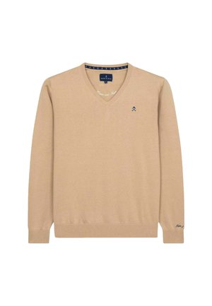 Beige v-hals trui gemaakt van zachte brei, met lange mouwen, een geribbelde zoom en een klein blauw logo op de borst.