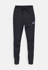 Black jogger pants made of soft fabric, featuring an elastic waistband, drawstring, and white side stripes with an Adidas logo on the thigh.