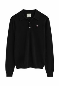 Zwarte polo met lange mouwen, gemaakt van zachte stof, met een klassieke kraag, een drieknoopsluiting en een klein geborduurd logo op de borst.