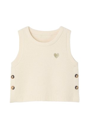 Cremfarbener, gerippter, ärmelloser, kurz geschnittener Pullover mit rundem Ausschnitt, seitlichen Knopfdetails und kleiner goldener Herzverzierung auf der rechten Brust vorne.