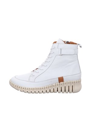 White leather high-top boots with a textured beige sole, featuring a brown accent and a lace-up design with a side zipper for easy wear.