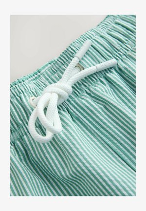 Next, REGULAR FIT - SNOOPY LICENSE SEERSUCKER STRIPED INCH - Short de bain - green/white