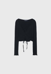 Black cropped cardigan with long sleeves, ribbed texture, and V-neck design. Features a tie closure at the waist and frayed hem.
