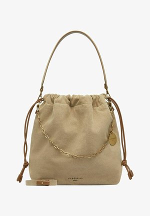 Sac seau en tissu beige doux avec fermeture à cordon, détail chaîne dorée, poignées en cuir et logo "Liebeskind Berlin" en bas au centre.
