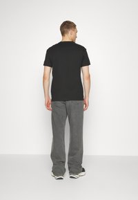 Calvin Klein Jeans HYPER REAL BOX LOGO UNISEX - T-shirts print - ck black