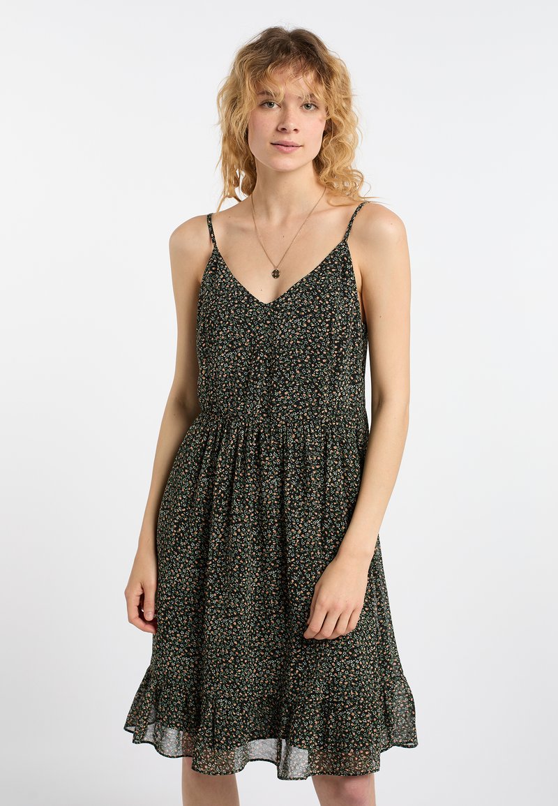 Blomstret kjole med fitted bodice, V-hals og spaghetti stropper. Lavet af letvægtsstof med en flæset kant i mørkegrøn med små blomster.