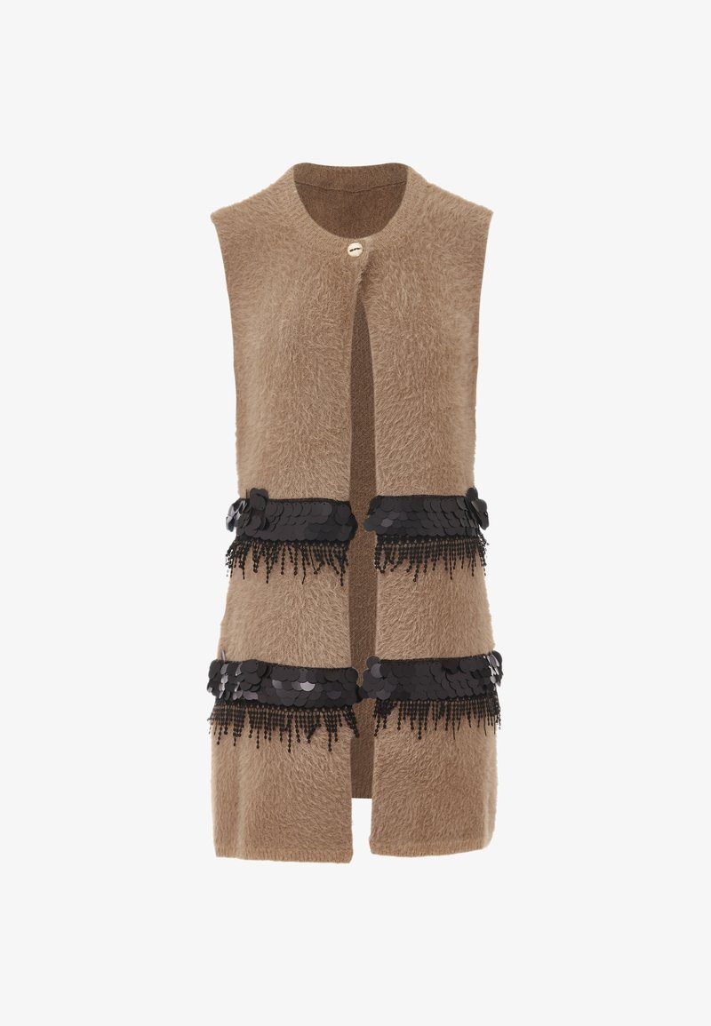 Beige mouwloos vest met een fuzzy textuur, met twee banden versierd met zwarte pailletten. Afgewerkt met een eenvoudige ronde knoopsluiting.
